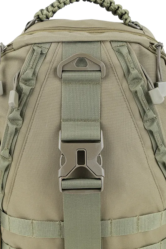 Close-up of a strap buckle on an olive green tactical backpack.