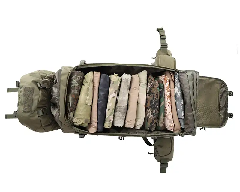 opend main compartment of a large tactical hiking backpack packed with clothing