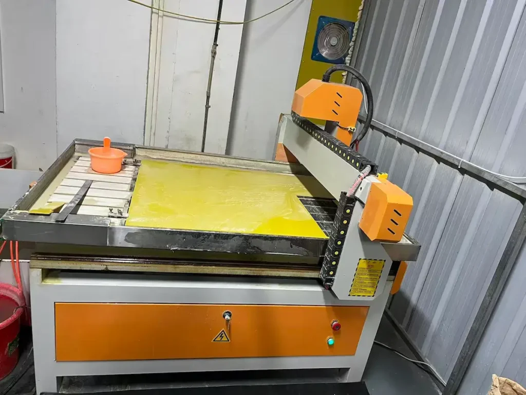 A CNC cutting machine in our factory, used to carve hard molds