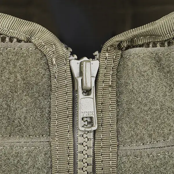 zipper on a green tactical vest